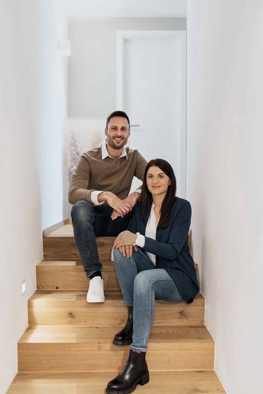 Ronny and Mariana, hosts of AlpineLake Apartments in Spiez
